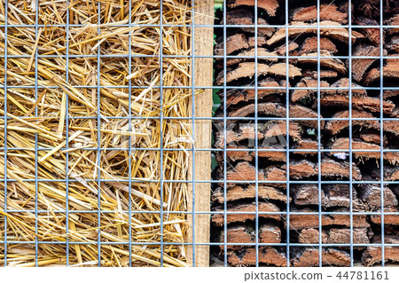 Close-up part of craft hotel or house for wild bees and other insect made of natural eco materials Close-up part of craft hotel or house for wild bees and other insect made of natural eco materials 44781161