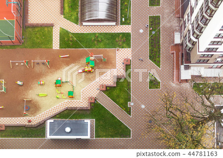 Top view of inner yard of apartment building complex with childr Top view of inner yard of apartment building complex with childr 44781163