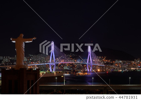 Jesus Tower of Busan Donghang Cathedral and Busan Harbor Bridge Night View 44781931