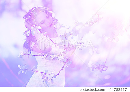 spring girl apple flowers, nature portrait of happy girl with long hair in blooming apple trees, freedom purity concept of happiness spring girl apple flowers, nature portrait of happy girl with long hair in blooming apple trees, freedom purity concept of happiness 44782357