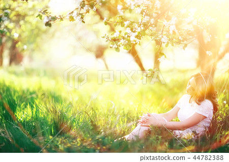 spring girl apple flowers, nature portrait of happy girl with long hair in blooming apple trees, freedom purity concept of happiness spring girl apple flowers, nature portrait of happy girl with long hair in blooming apple trees, freedom purity concept of happiness 44782388
