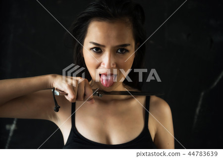 psychosis woman holding knife, Halloween 44783639