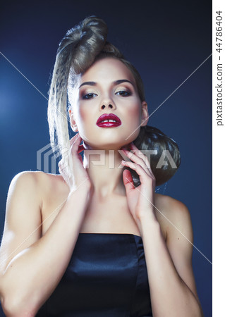 young elegant woman with creative hair style leopard print close 44786404