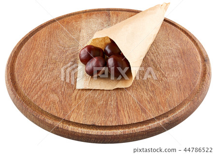 Chestnuts in paper package. Isolated 44786522