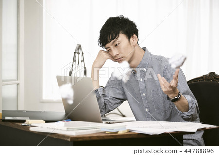 Man working from home 44788896