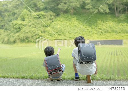 Elementary school students on the way to school 44789253