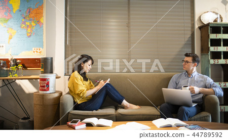 Woman studying English in a cafe 44789592