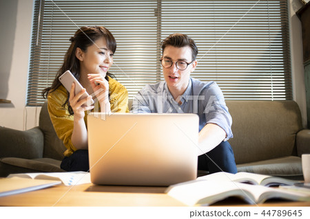 Woman studying English in a cafe 44789645