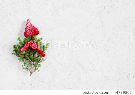 Christmas tree with rad hat and scarf 44789802
