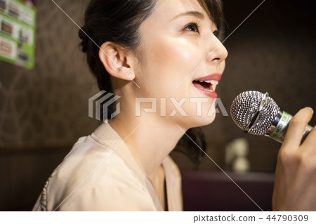 Women who enjoy karaoke alone Women who enjoy karaoke alone 44790309