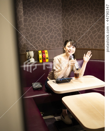 Women who enjoy karaoke alone 44790347