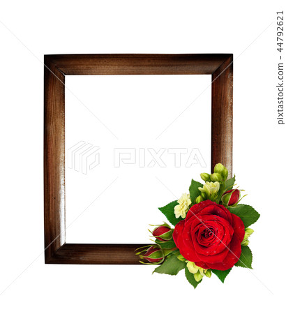 Red roses and bouvardia flowers with wooden frame Red roses and bouvardia flowers with wooden frame 44792621