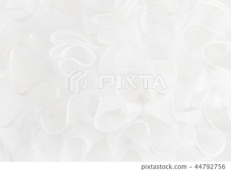 Closeup of white fabric frills 44792756