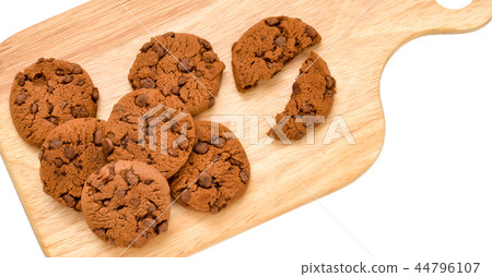 Biscuits with chocolate on a wooden board Isolated 44796107