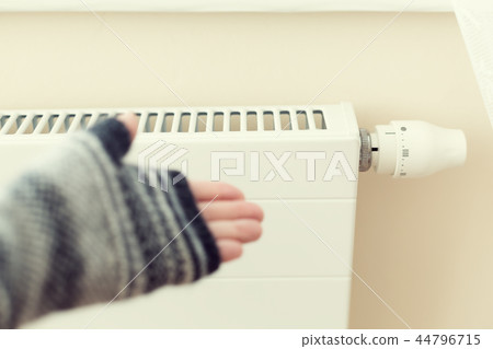 White radiator with a thermostat 44796715