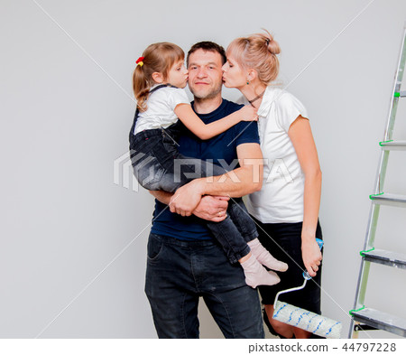 parents and child are paint a new room parents and child are paint a new room 44797228