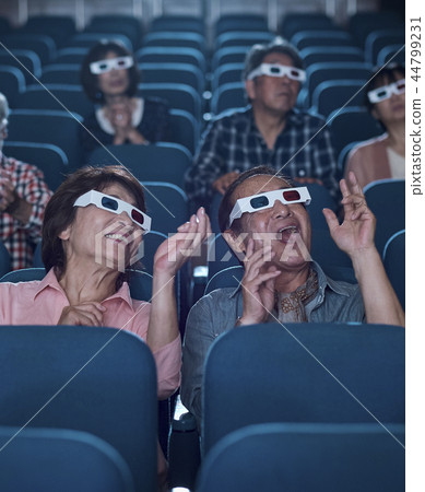 Spectators watching 3D movies Spectators watching 3D movies 44799231