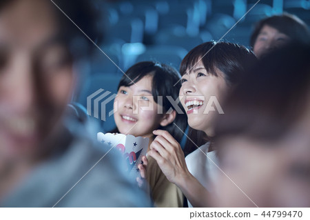 Spectators watching a movie in a cinema 44799470