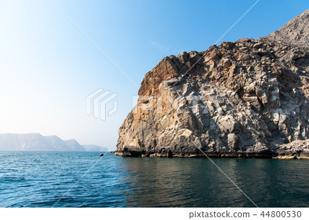 Scenic seaside surrounded by rocks in Khasab Oman 44800530