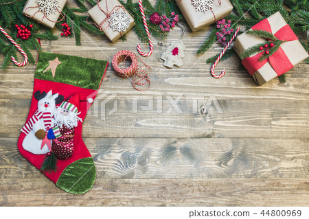 Christmas holiday border-sock, gifts,holly berries 44800969