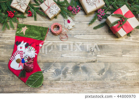 Christmas holiday border-sock, gifts,holly berries Christmas holiday border-sock, gifts,holly berries 44800970