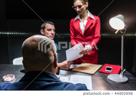 Suspect or witness during police interrogation 44802698