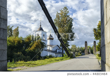 Suspension bridge across the river and the temple on the shore Suspension bridge across the river and the temple on the shore 44803464