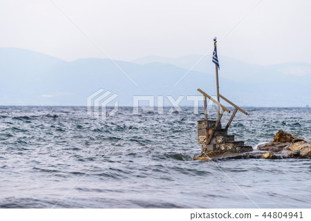 Broken old stairs into water 44804941