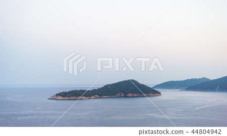 Kinira island at sunset 44804942