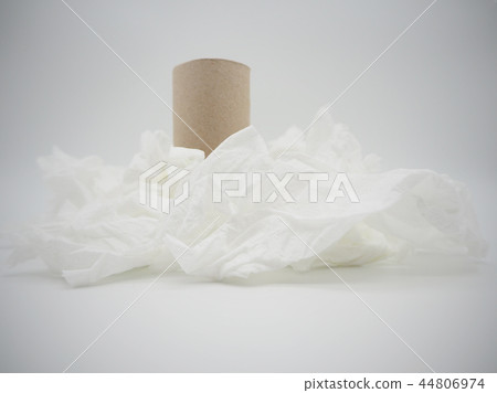 Pile of tissue paper with roll core. 44806974