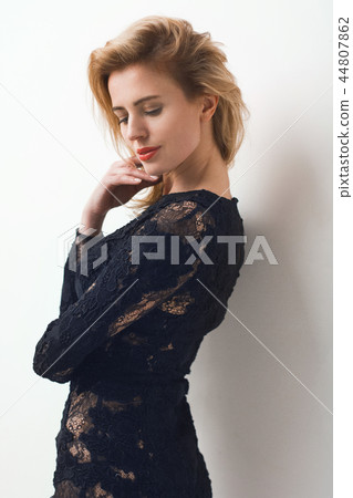 Beautiful woman in lace dress. 44807862