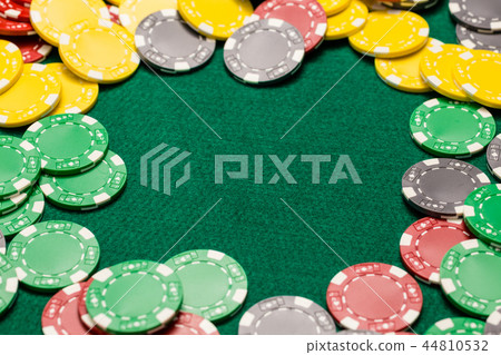 Frame of scattered casino chips 44810532