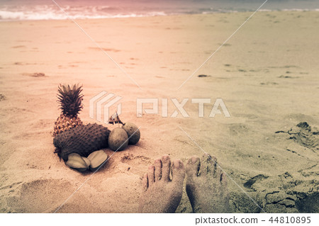 Exotic fruits on the sand 44810895