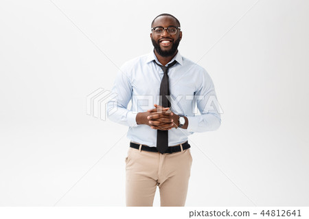 Headshot of successful smiling cheerful african american businessman executive stylish company Headshot of successful smiling cheerful african american businessman executive stylish company 44812641