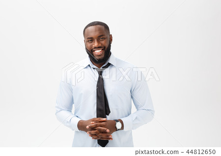 Headshot of successful smiling cheerful african american businessman executive stylish company Headshot of successful smiling cheerful african american businessman executive stylish company 44812650