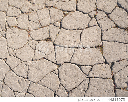 The texture of old asphalt with cracks. 44815975