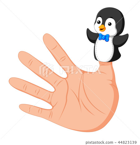 hand wearing a cute penguin finger puppet on thumb hand wearing a cute penguin finger puppet on thumb 44823139