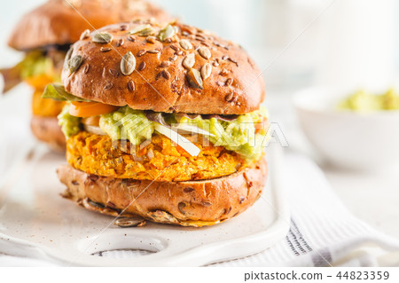 Vegan sweet potato (or pumpkin) burgers on white Vegan sweet potato (or pumpkin) burgers on white 44823359