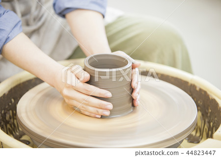 A woman doing ceramics 44823447