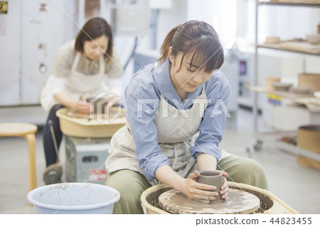 A woman doing ceramics 44823455