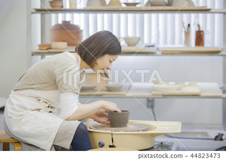A woman doing ceramics A woman doing ceramics 44823473