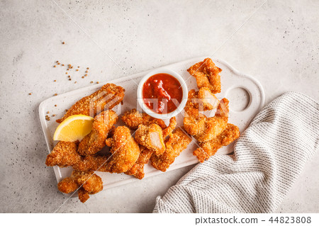 Fried Breaded chicken with tomato sauce Fried Breaded chicken with tomato sauce 44823808