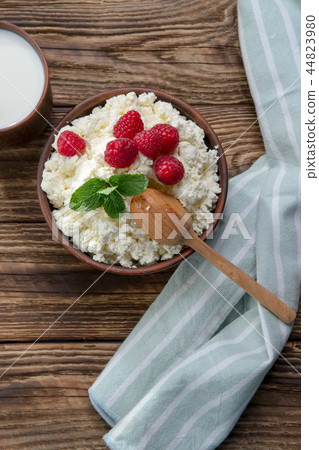 Fresh cottage cheese with raspberries  44823980
