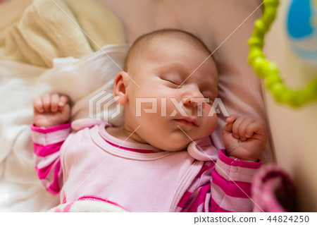 Close-up of newborn baby sleeping 44824250