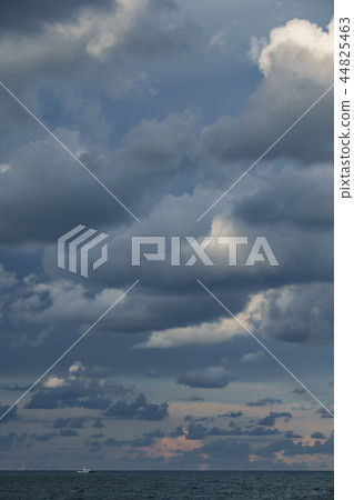 Long shot of guardia civil boat in the sea horizon Long shot of guardia civil boat in the sea horizon 44825463