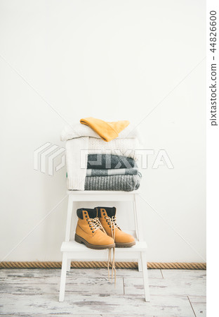 Warm clothing, blankets, boots and cap for cold weather 44826600
