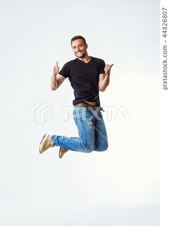 Happy excited man jumping 44826807