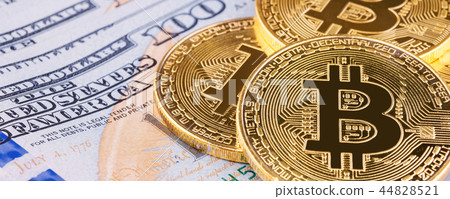 Bitcoin putting on US Dollar bank background 44828521