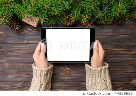 woman hands using tablet computer woman hands using tablet computer 44828626