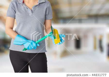 Female cleaning staff in bathroom 44831777
